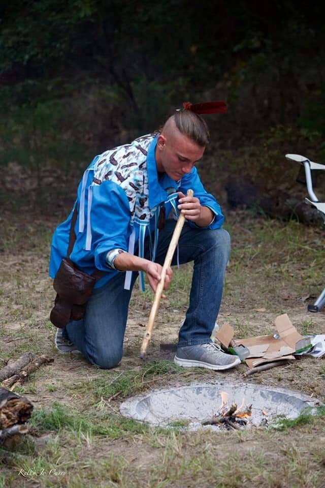 Tribal Fire Keeper Gordon Kemp keeping the sacred fire burning